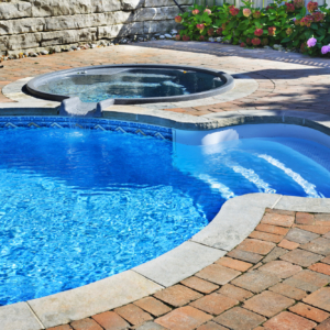 In Ground Pool Installation with separate built in hot tub